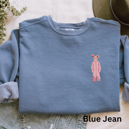 Embroidered Christmas Story Pigment Dyed Crewneck Sweatshirt: A Christmas Story Ralphie in Pink Bunny Costume