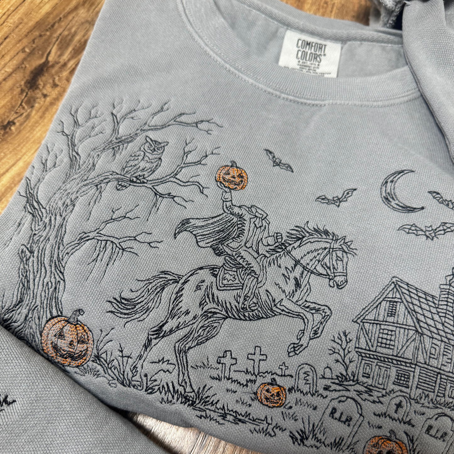 Embroidered Headless Horseman Crewneck Sweatshirt: Pigment Dyed Sleepy Hollow Sketched Line Art Pullover