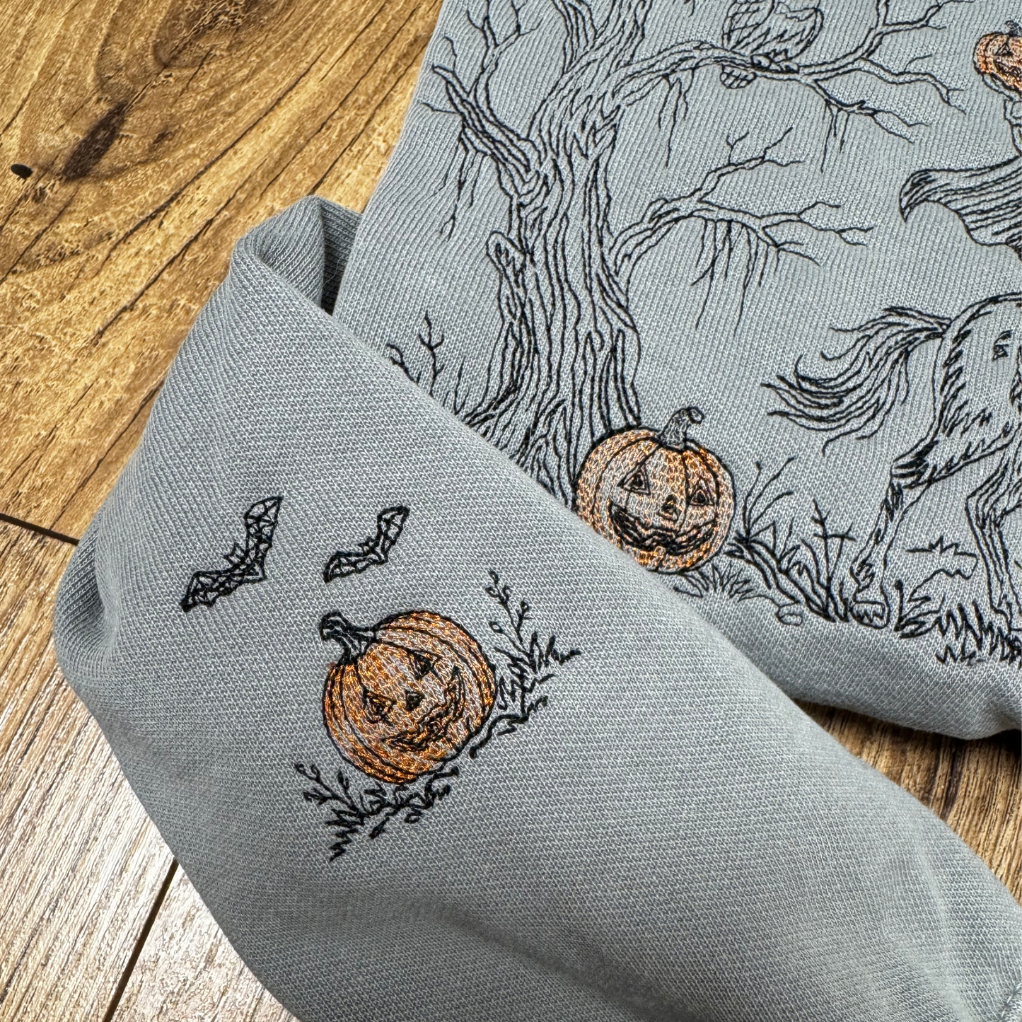 Embroidered Headless Horseman Crewneck Sweatshirt: Pigment Dyed Sleepy Hollow Sketched Line Art Pullover
