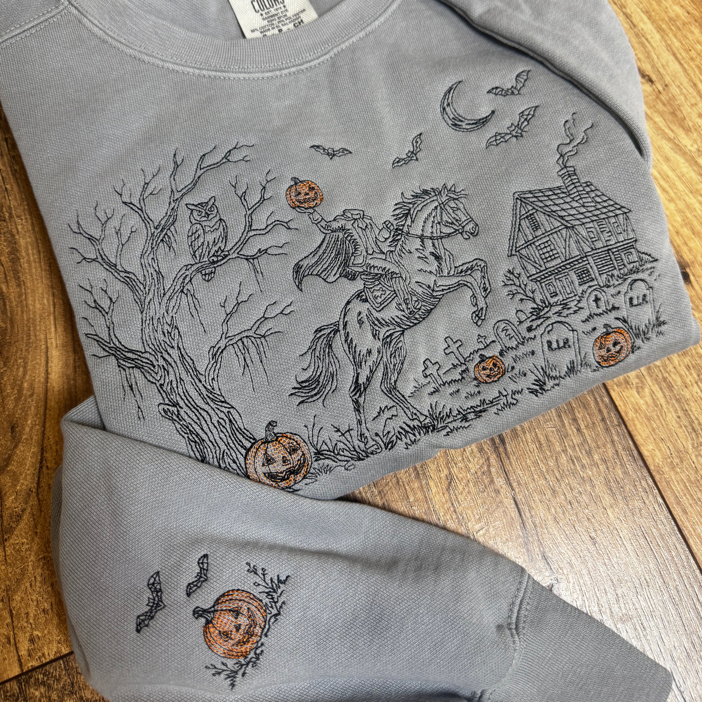 Embroidered Headless Horseman Crewneck Sweatshirt: Pigment Dyed Sleepy Hollow Sketched Line Art Pullover