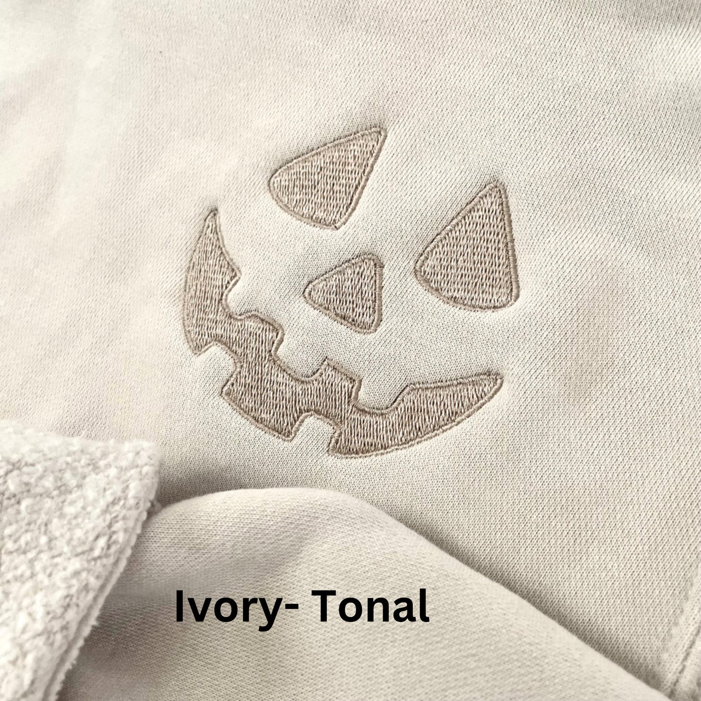 Embroidered Halloween Pumpkin Face Sweatshirt: Pigment Dyed Spooky Season Pullover