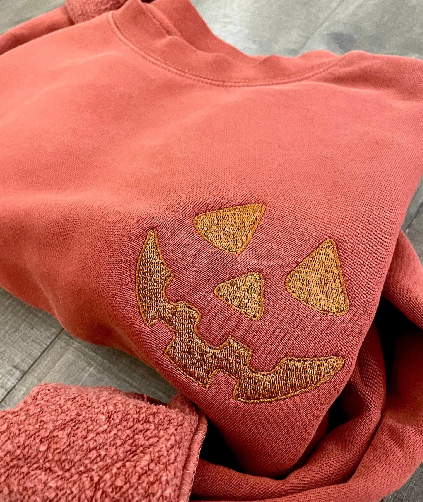 Embroidered Halloween Pumpkin Face Sweatshirt: Pigment Dyed Spooky Season Pullover