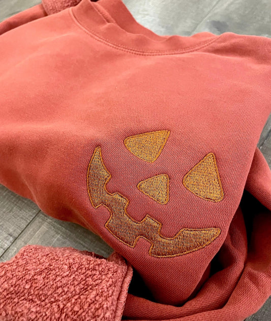 Embroidered Halloween Pumpkin Face Sweatshirt: Pigment Dyed Spooky Season Pullover