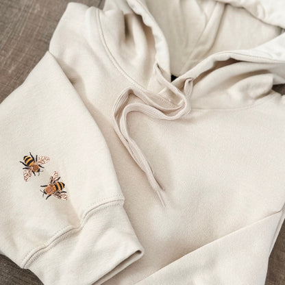 Embroidered Minimalist Honey Bee Sleeve Hoodie: Cozy Nature Inspired Pullover