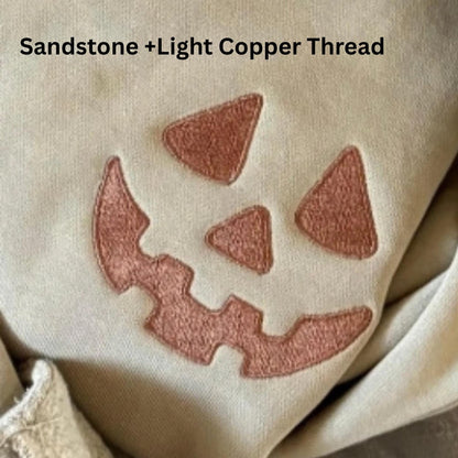 Youth Unisex Embroidered Pumpkin Face Hoodie: Pigment Dyed Halloween Pullover