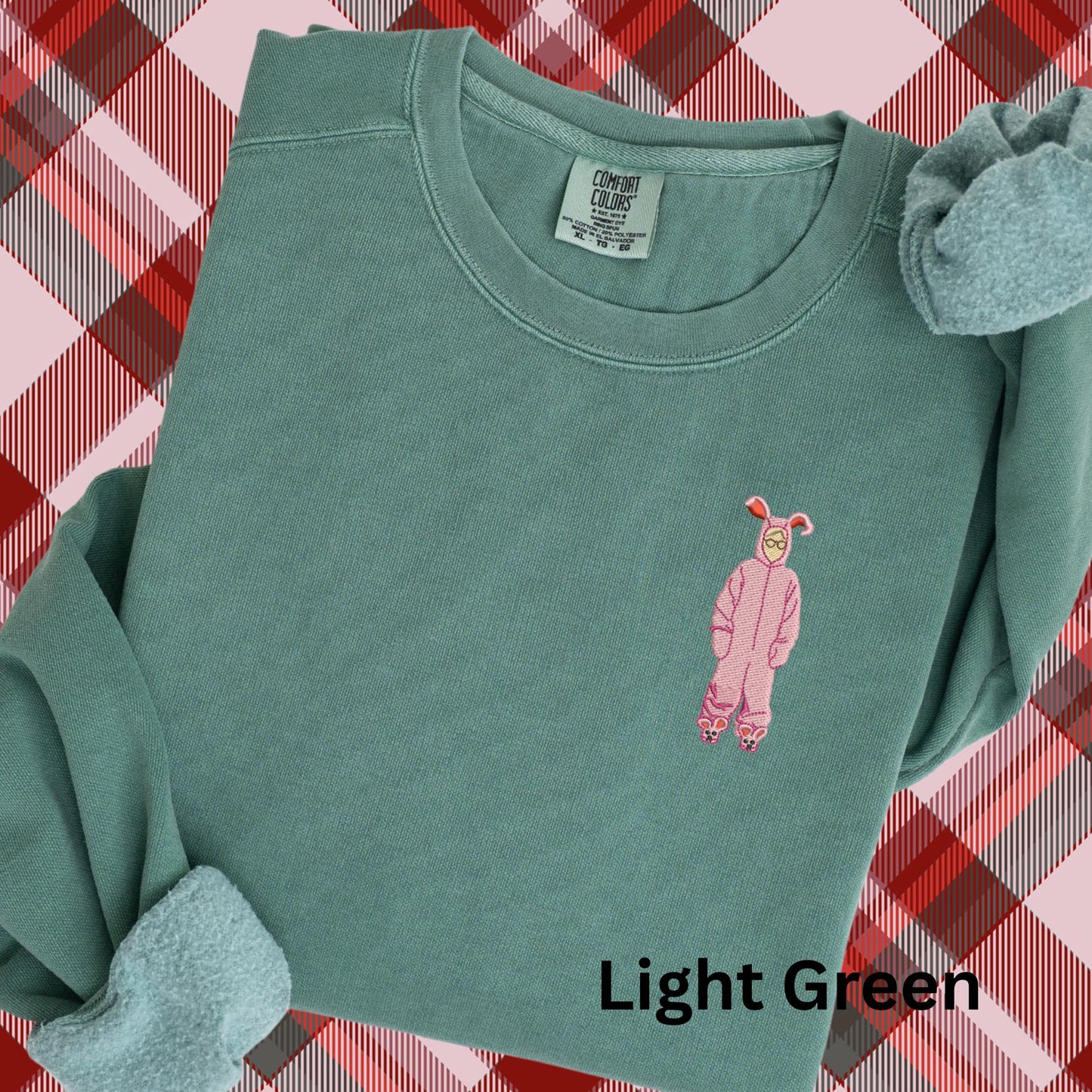 Embroidered Christmas Story Pigment Dyed Crewneck Sweatshirt: A Christmas Story Ralphie in Pink Bunny Costume