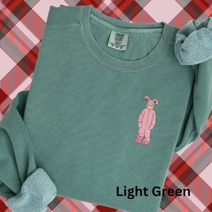 Embroidered Christmas Story Pigment Dyed Crewneck Sweatshirt: A Christmas Story Ralphie in Pink Bunny Costume