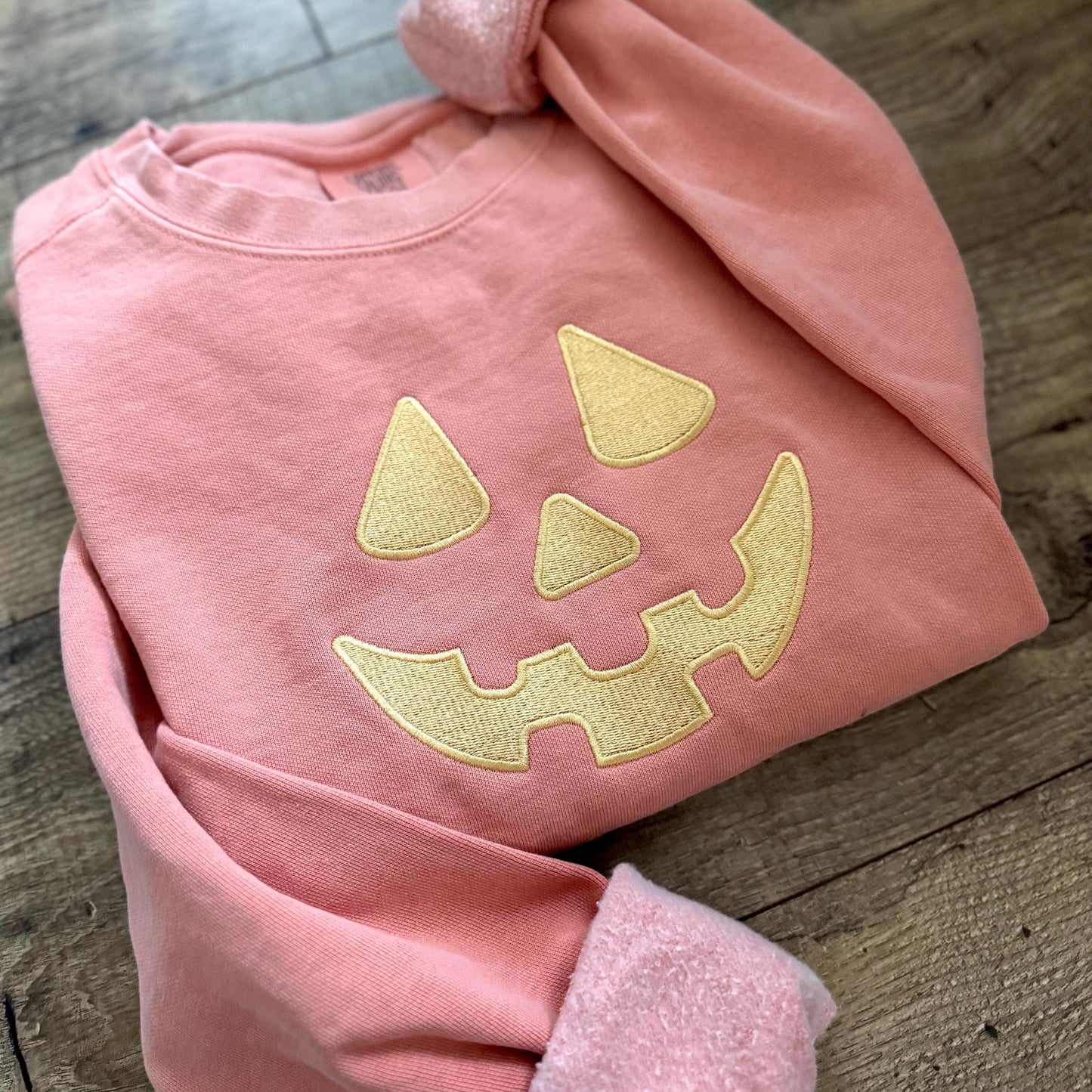 Embroidered Pumpkin Face Sweatshirt: Pastel Halloween Crewneck