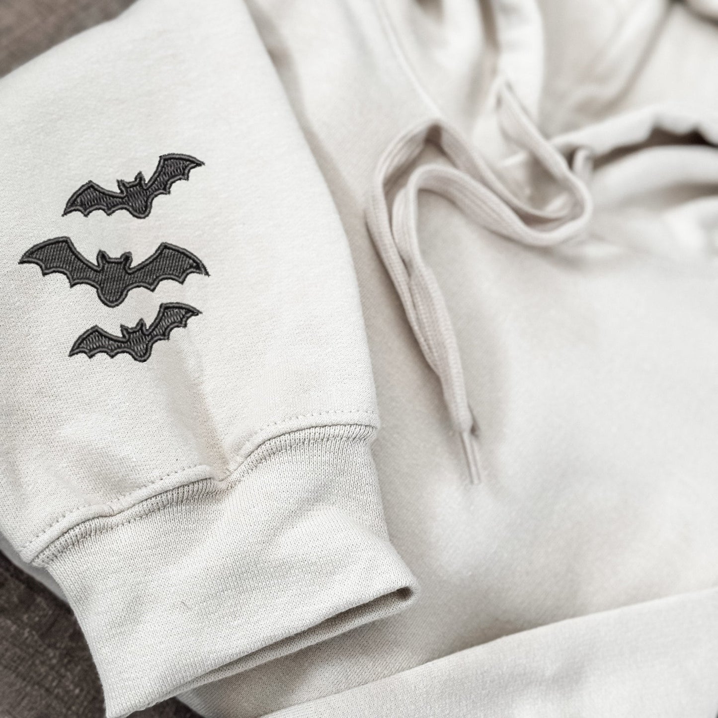 Embroidered Minimalist Bat Sleeve Hoodie: Trendy Halloween Pullover