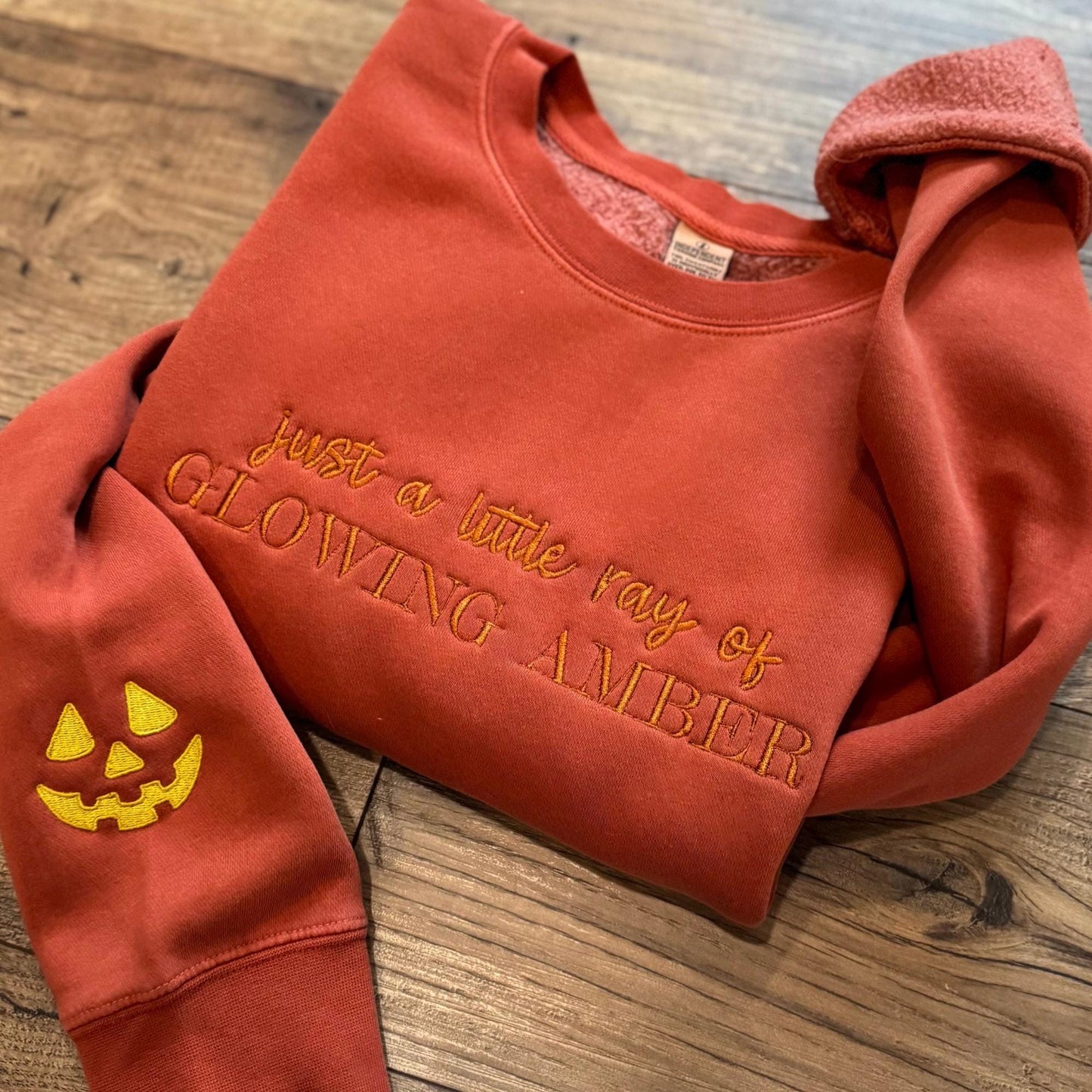 Embroidered Little Ray of Glowing Amber Pumpkin Sweatshirt: Spooky Season Pigment-Dyed Pullover