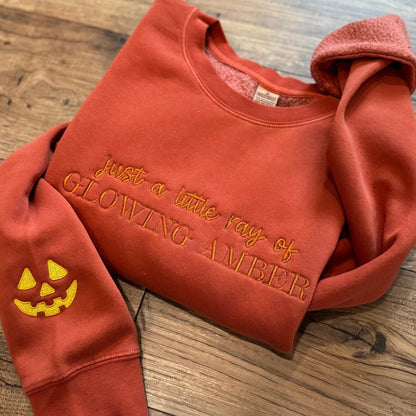 Embroidered Little Ray of Glowing Amber Pumpkin Sweatshirt: Spooky Season Pigment-Dyed Pullover
