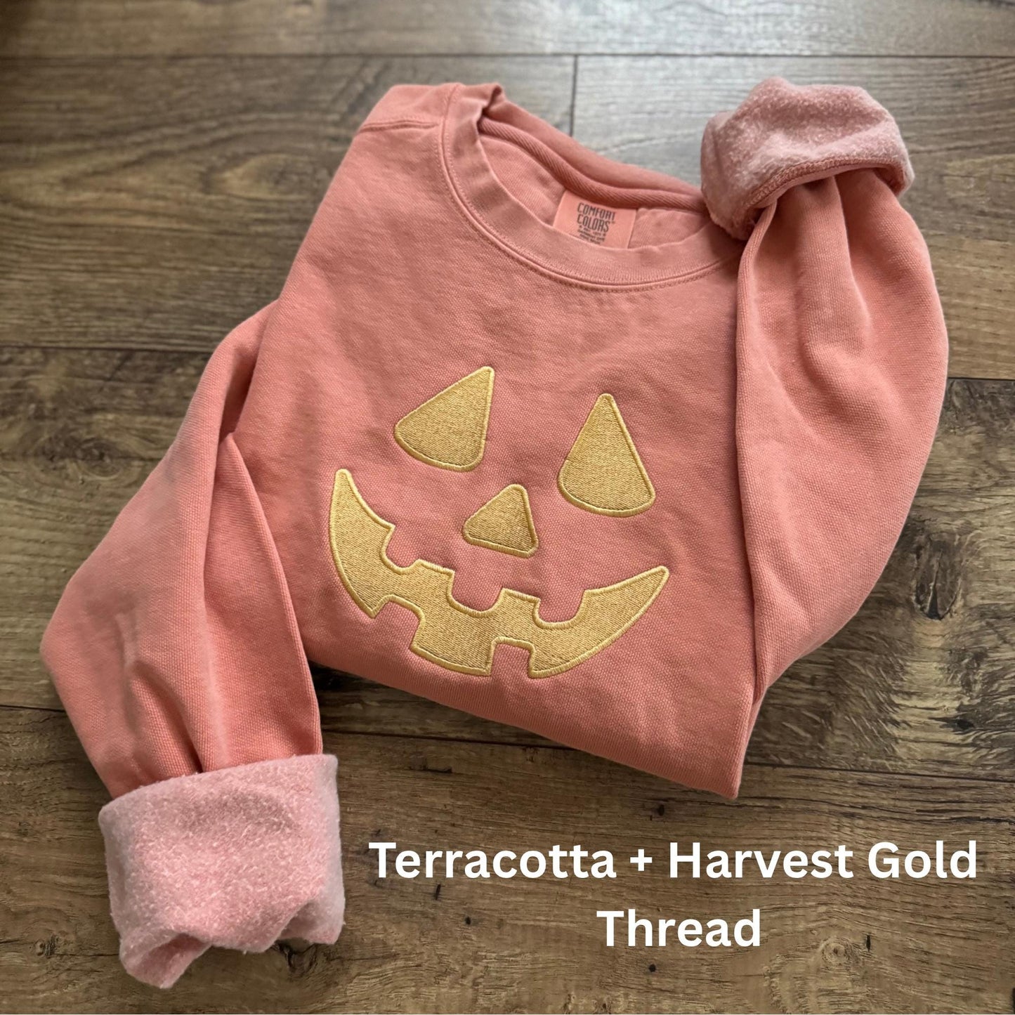 Embroidered Pumpkin Face Sweatshirt: Pastel Halloween Crewneck