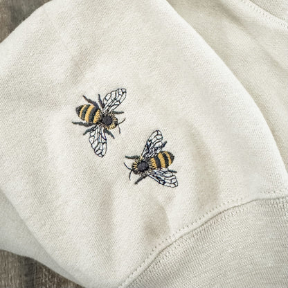 Embroidered Minimalist Honey Bee Sleeve Hoodie: Cozy Nature Inspired Pullover
